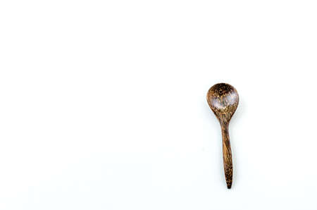 Wooden spoon on the white backgroundの写真素材