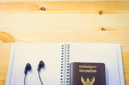 Accessories for traveler: passport earphone music and notebookの写真素材