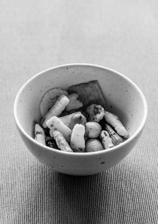 Snack for drinking time on the tablecloth: black and whiteの写真素材