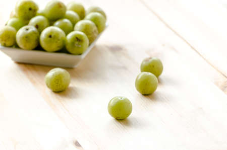 Indian Gooseberry: berry of high vitamin-c on the wooden backgroundの写真素材