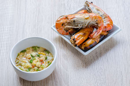 Thai style barbecue, grilled shrimp with seafood spicy dipping sauceの写真素材