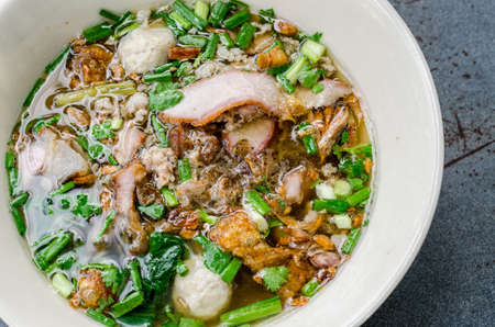 Noodles with pork and pork balls with soup Thai style.の写真素材