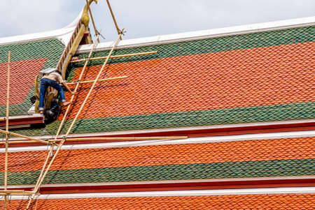 Worker work for fixed and changed rooftopの写真素材