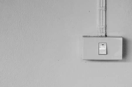 Black and white Electric switch on the wallの写真素材