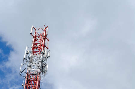 Telecommunication pole over the clouds