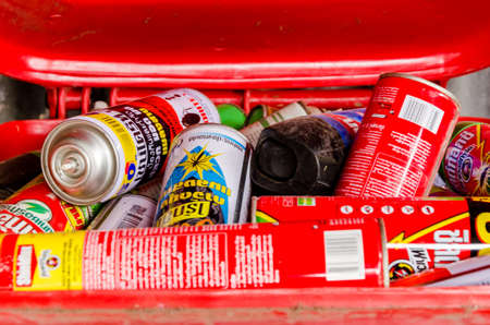 PHETCHABUN PROVINCE, THAILAND-JULY 28: Hazadous waste frome household in red container, Aluminum can spray JULY 13 , 2016 in PHETCHABUN PROVINCE THAILANDの写真素材