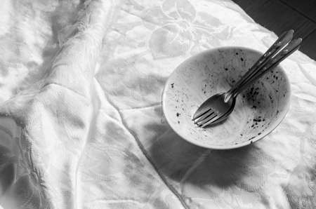 dirty and empty bowl: black and white tone filterの写真素材