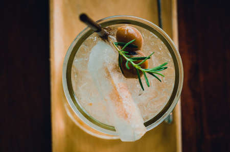 Sour and fresh of yellow plum juice with soft drink, cinematic tone filter and soft focusの写真素材