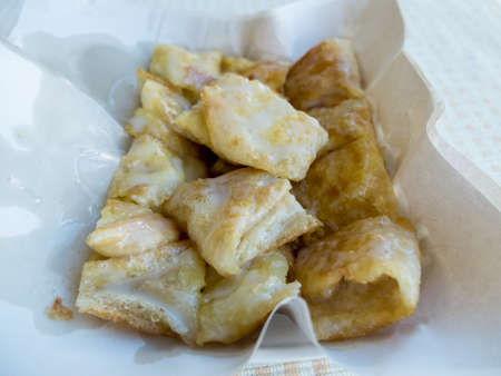 Sweet Roti with milk and sugar on paper plateの写真素材