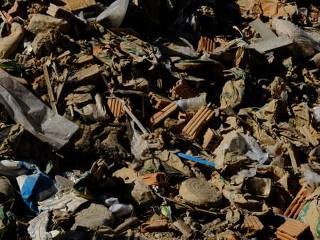 Constructed waste from the city, brick and concrete in dump siteの写真素材