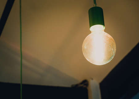 Old light bulb in the vintage roomの写真素材