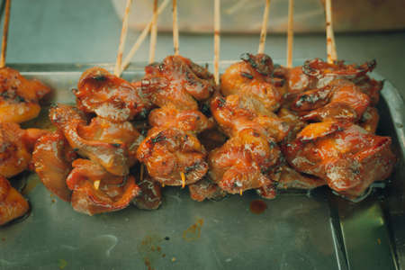 Thai Street Food, grilled gizzard chicken for mealの写真素材