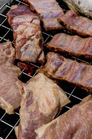 Roasted pork rib Grilled, BBQ in Thai style. The famous of Thai street food in Thailandの写真素材