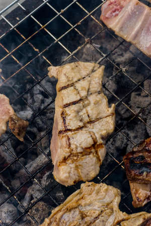 Roasted pork rib Grilled, BBQ in Thai style. The famous of Thai street food in Thailandの写真素材