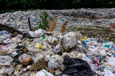 KANCHANABURI PROVINCE, THAILAND. JUNE 18 2018. Waste from household in waste landfill. Waste disposal in dumping site in THAILANDのeditorial素材
