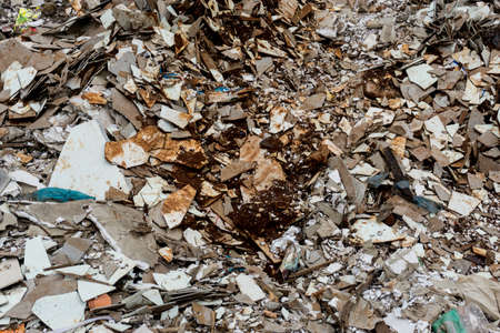 Construction waste from home and village in waste dump site in Thailandのeditorial素材