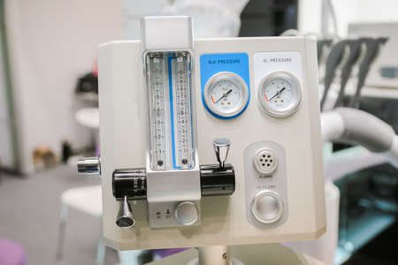 metal Dental equipment tools with blurry backgroundの写真素材