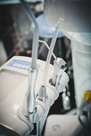 metal Dental equipment tools with blurry background . Verticalの写真素材