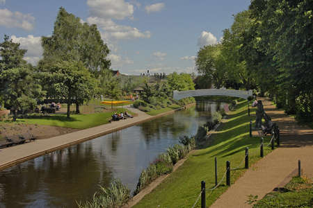 The river Sow flows through the park at Stafford in England.のeditorial素材