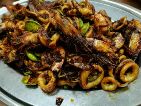 Asian favorite stink bean with sambal chili, shrimp and squidの素材