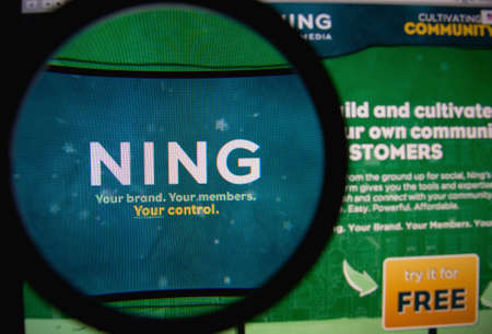 LISBON, PORTUGAL - FEBRUARY 19, 2014: Photo of Ning homepage on a monitor screen through a...