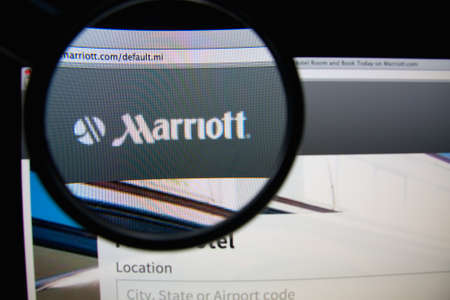 LISBON, PORTUGAL - FEBRUARY 22, 2014: Photo of Marriott homepage on a monitor screen through a...