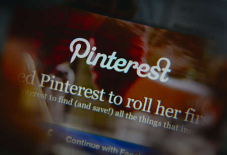 LISBON, PORTUGAL - AUGUST 3, 2014: Photo of Pinterest homepage on a monitor screen through a...