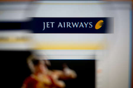 LISBON, PORTUGAL - AUGUST 27, 2014: Photo of Jet Airways homepage on a monitor screen through a...