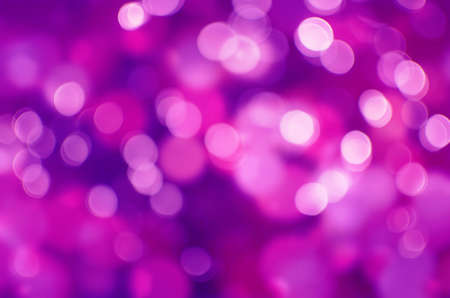 Abstract holiday background, beautiful shiny Christmas lights, glowing magic bokehの写真素材