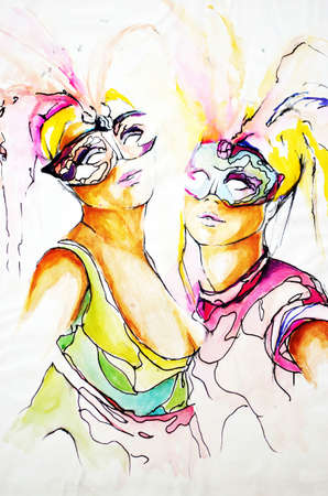 Beautiful young women with carnival masks の写真素材