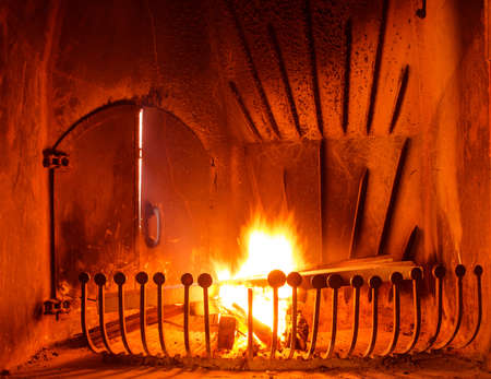 Flames of fire in a fireplaceの写真素材