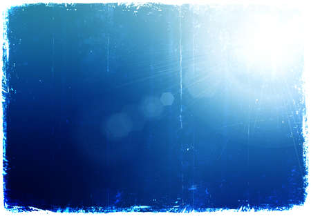 Shining sun at clear grunge blue sky の写真素材