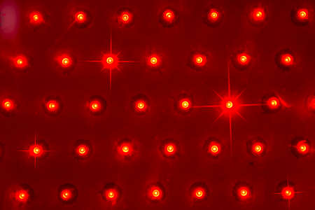 wall of red lighting bulbsの写真素材