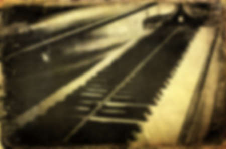 Blurred Grunge piano musical background and added paper textureの写真素材