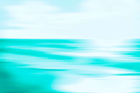 An abstract blue ocean seascape with blurred panning motion. Image displays a retro vintage look with cross-processed colors.