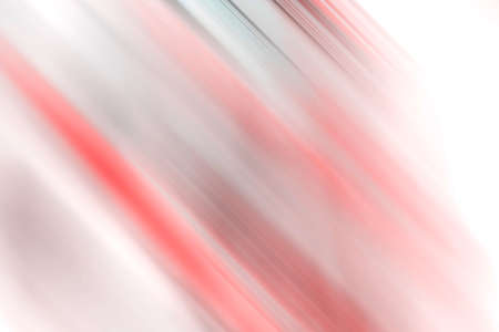 Pink and orange blurred stripes and white spotlight colorful background.の写真素材