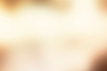 abstract gold background luxury Christmas holiday wedding background brown frame bright spotlight smooth vintage background texture gold paper layout design bronze brass background sunshine gradientの写真素材