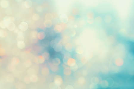 Lights on blue background. holiday bokeh. Abstract. Christmas background Festive abstract background with bokeh defocused lights and starsの写真素材