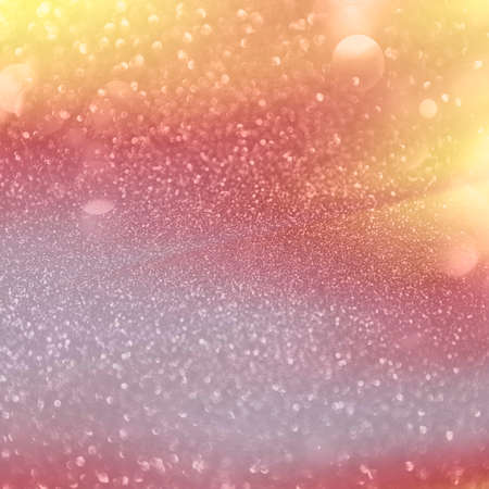 Colorful  Holiday glowing Abstract Glitter Defocused Background With Blinking Stars. Blurred gold Bokeh.の写真素材