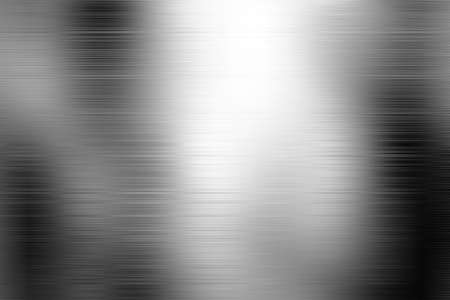 Brushed metal texture. Steel background. Silver foil texture background / steel texture black silver textured pattern background with reflections.の写真素材