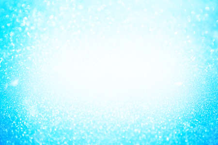 Abstract bokeh background. Glittering background. Abstract blue color background. Glittering background. Blue background Glitter backgroundの写真素材