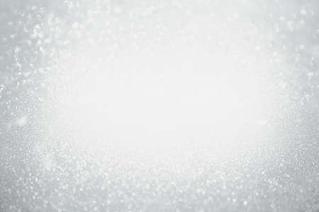 Abstract bokeh background. Christmas Glittering background. Abstract christmas grey color background. Glittering Christmas background. Silver christmas background Glitter christmas backgroundの写真素材