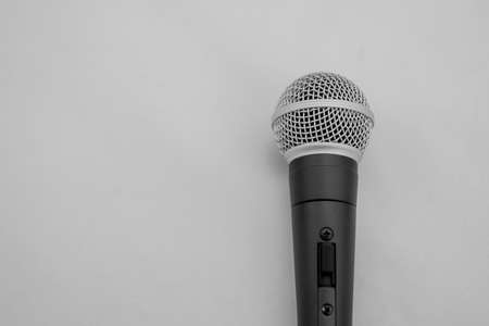 Dynamic microphone for voice and instrument in the foreground and shot vertically with capsule upの写真素材