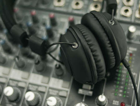 Headphones over an audiomixer