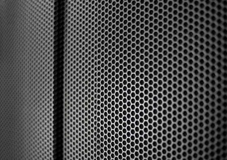 Protective grid close-up of an amplifier as a wallpaper