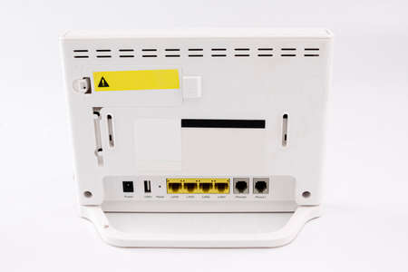 Wireless router isolated on white background. wifi technology concept. White wireless internet router isolated. Cable modem. Without antennaの写真素材