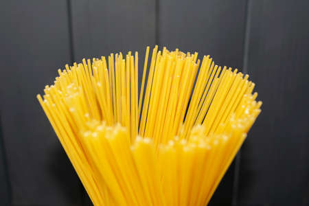 Spaghetti bouquet with gray wooden background