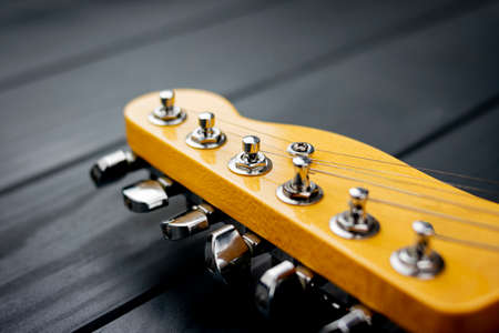 tuning headstock of an electric guitar with shiny chrome elementsの写真素材