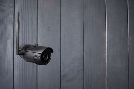 Video surveillance system using wifi security camera with night vision installed on a wallの写真素材