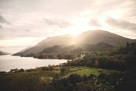 Sunset over the mountain and the Scottish countryside.